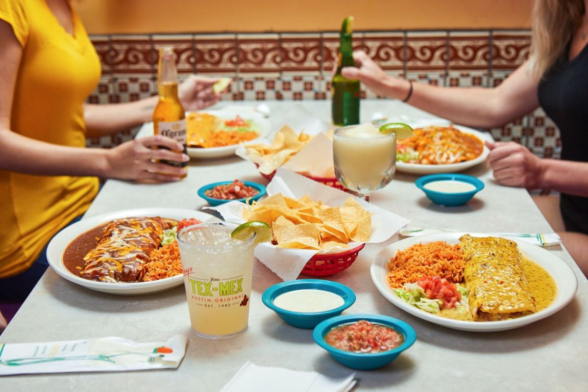 People gathered around a table at Chuy’s